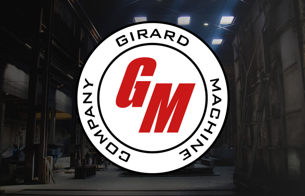 Girard Machine logo with shop background.