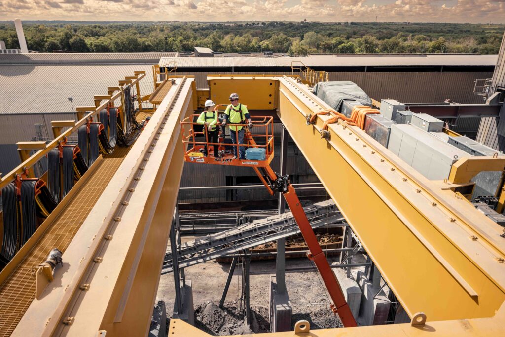 Morgan Site Services team assembles the bridge on site of the overhead crane as parts of its installation.