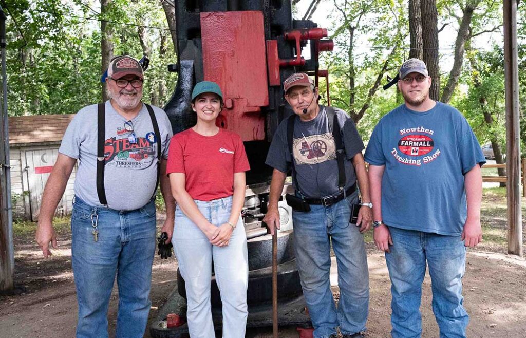 Virgil DeRung, Liza Lapish (Morgan representative), Duane Nelson, and Cody Wangen at the 2023 WMSTR show Steam Hammer exhibit