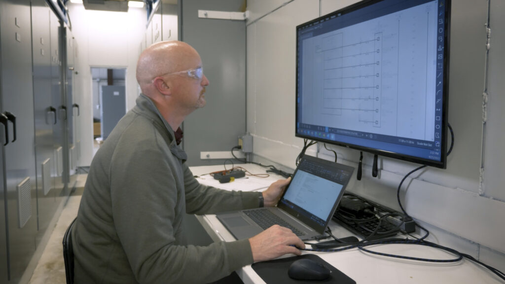 employee working in a control house