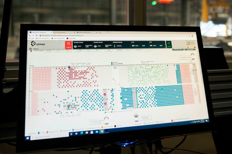 Computer monitor displaying the CEPHAS automation technology with pink, green, and blue colors displayed on the screen.