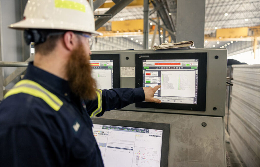 Operator accessing Crane Management system from yard station.