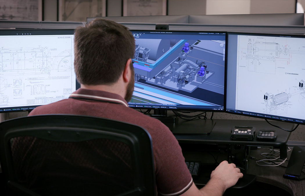 Morgan engineer working on a computer rendering