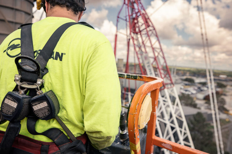 crane technician in a lift