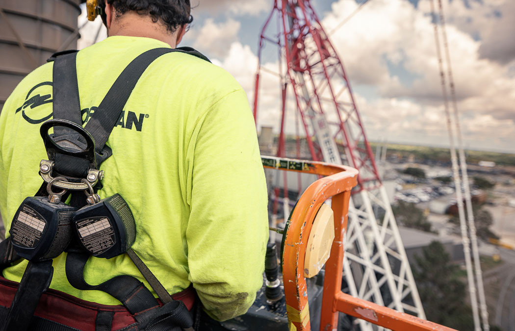 crane technician in a lift