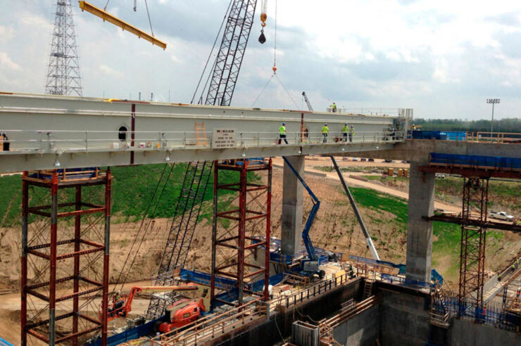 Morgan employees installing a crane outdoors