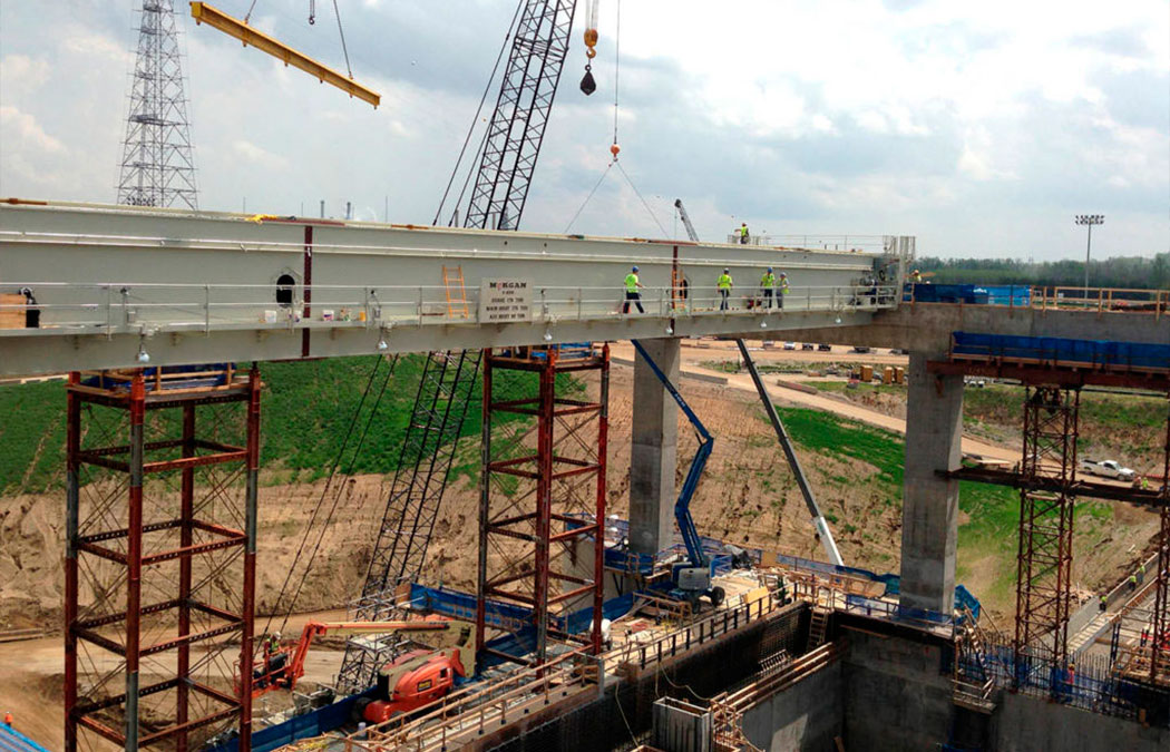 Morgan employees installing a crane outdoors