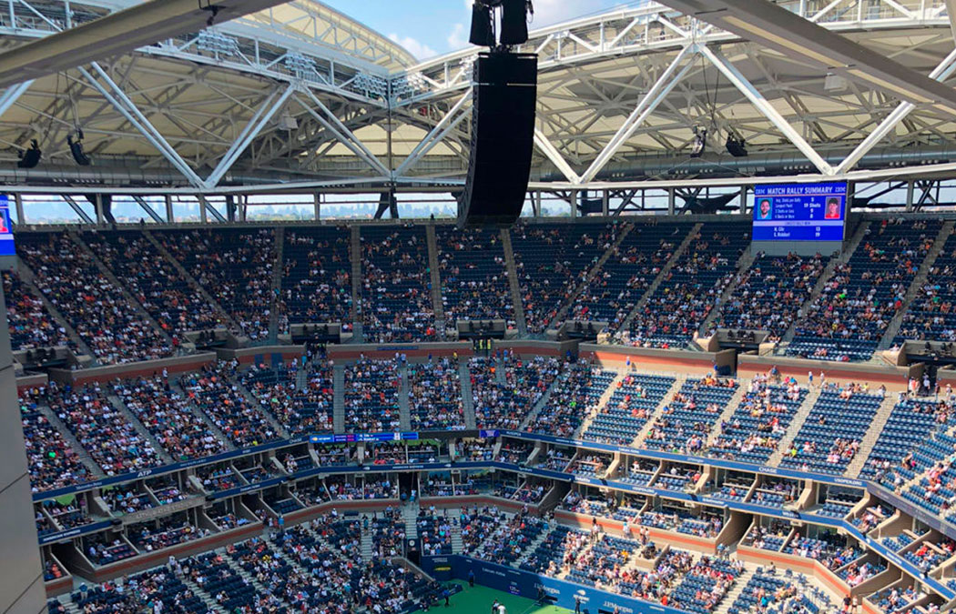 Arthur Ashe Stadium during a tennis match displaying their retractable roof