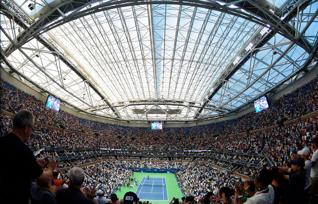 Arthur Ashe Stadium during a tennis match displaying their retractable roof