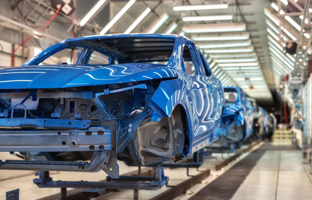 Blue car on the assembly line.