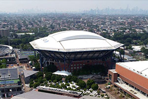 The exterior view of the world's largest United States Tennis Association building in New York with Morgan's retractable roof.